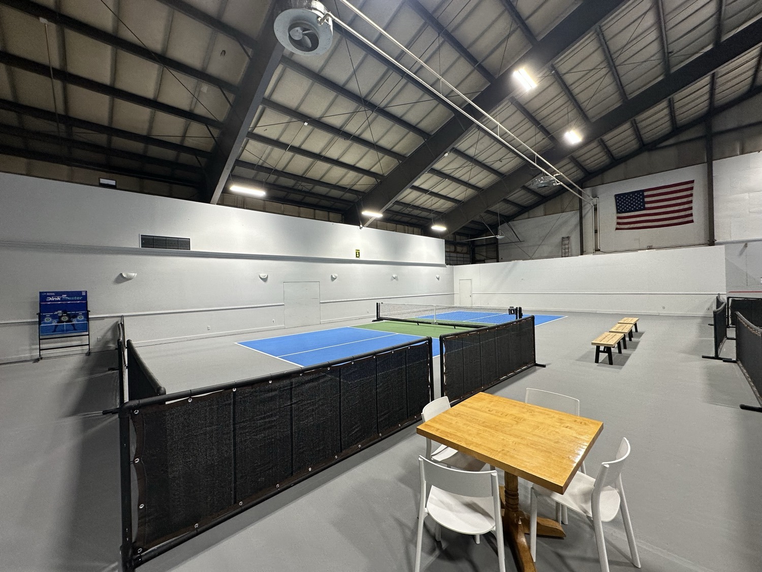 The WMPC facility — indoor courts with lounge seating