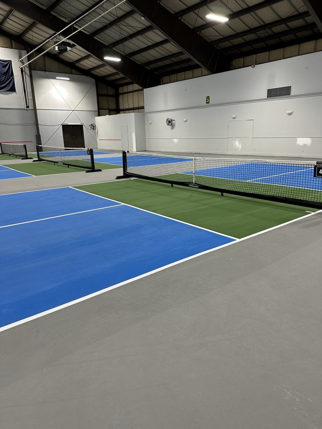 The indoor courts at White Mountain Pickleball Club