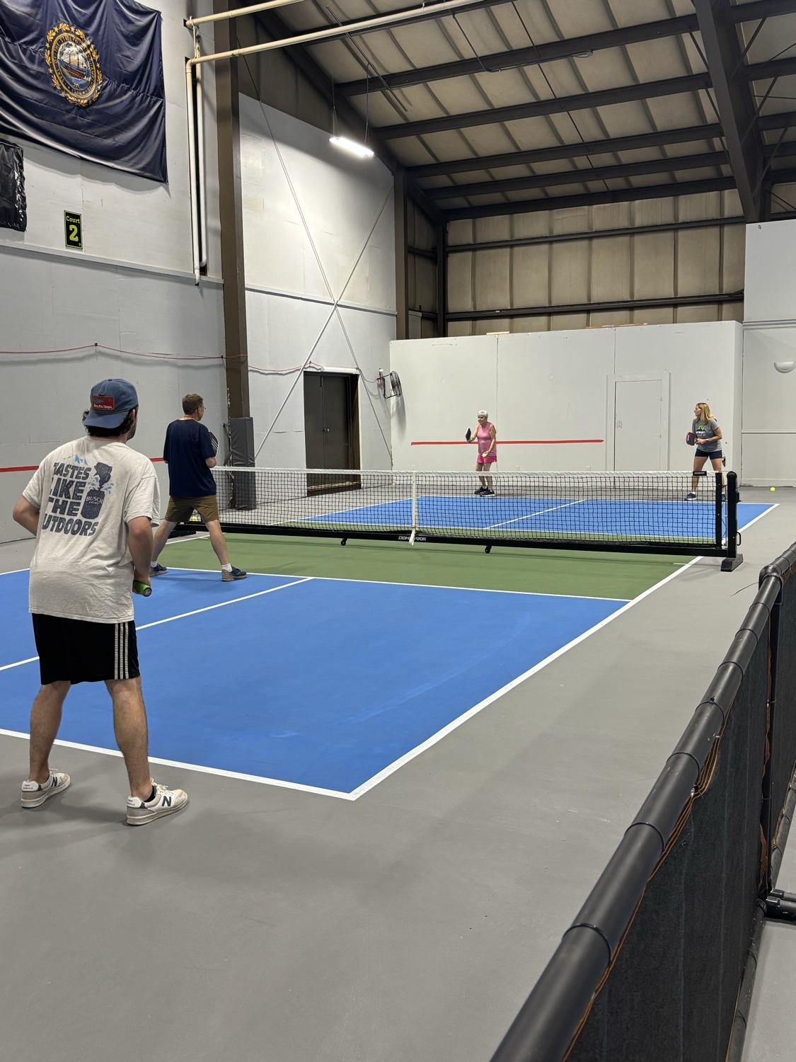Players in a rally on the indoor courts at WMPC